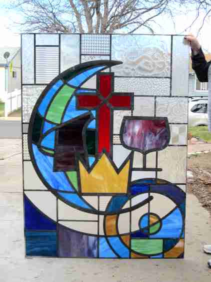 church logo in stained glass