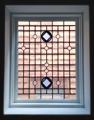 stained glass in the bathroom of the 2nd bedroom